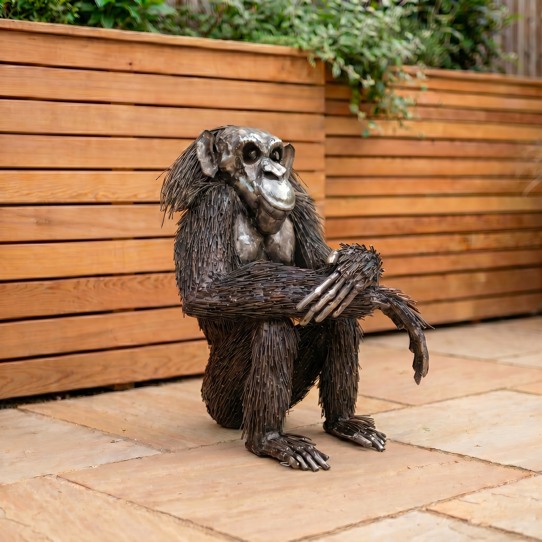 Knee-Resting Chimpanzee Sculpture