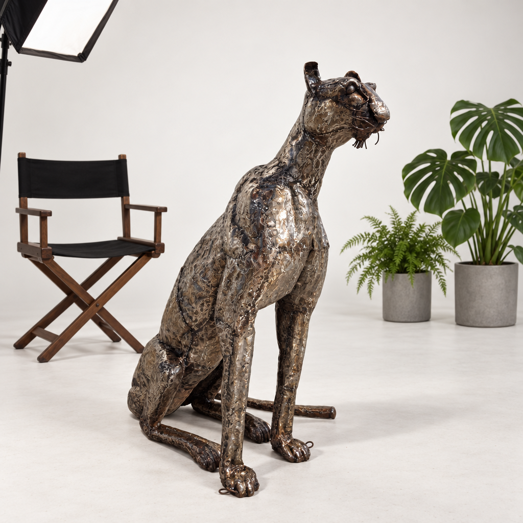 Sitting Cheetah Sculpture - Head Up, three-quarter view in the studio