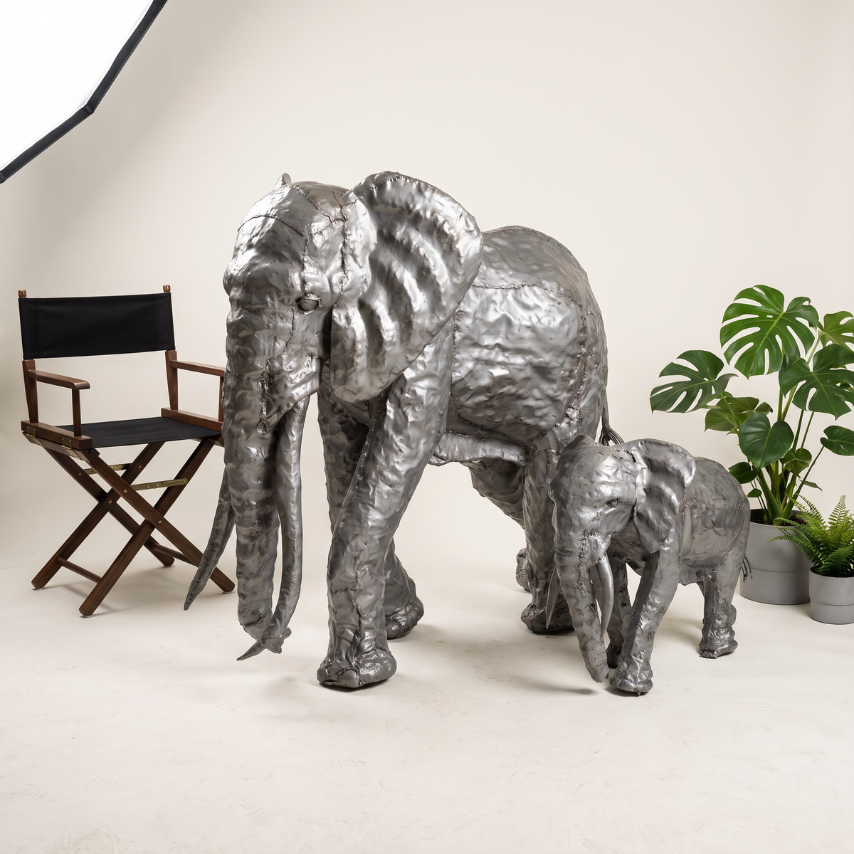 Silver-grey 4ft and 2ft elephant sculpture bundle, studio front