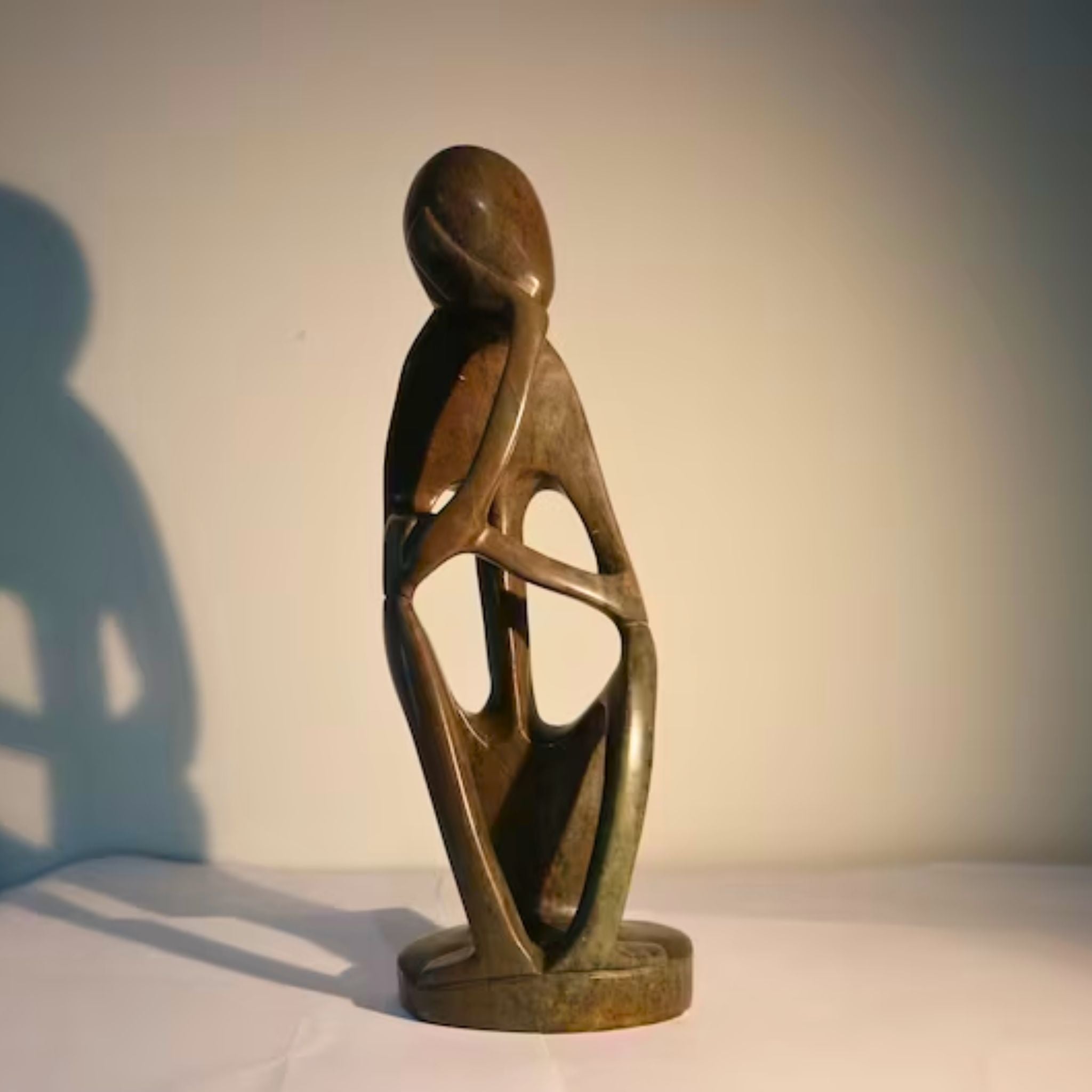 Thinker Optimist Stone - Pangea Sculptures