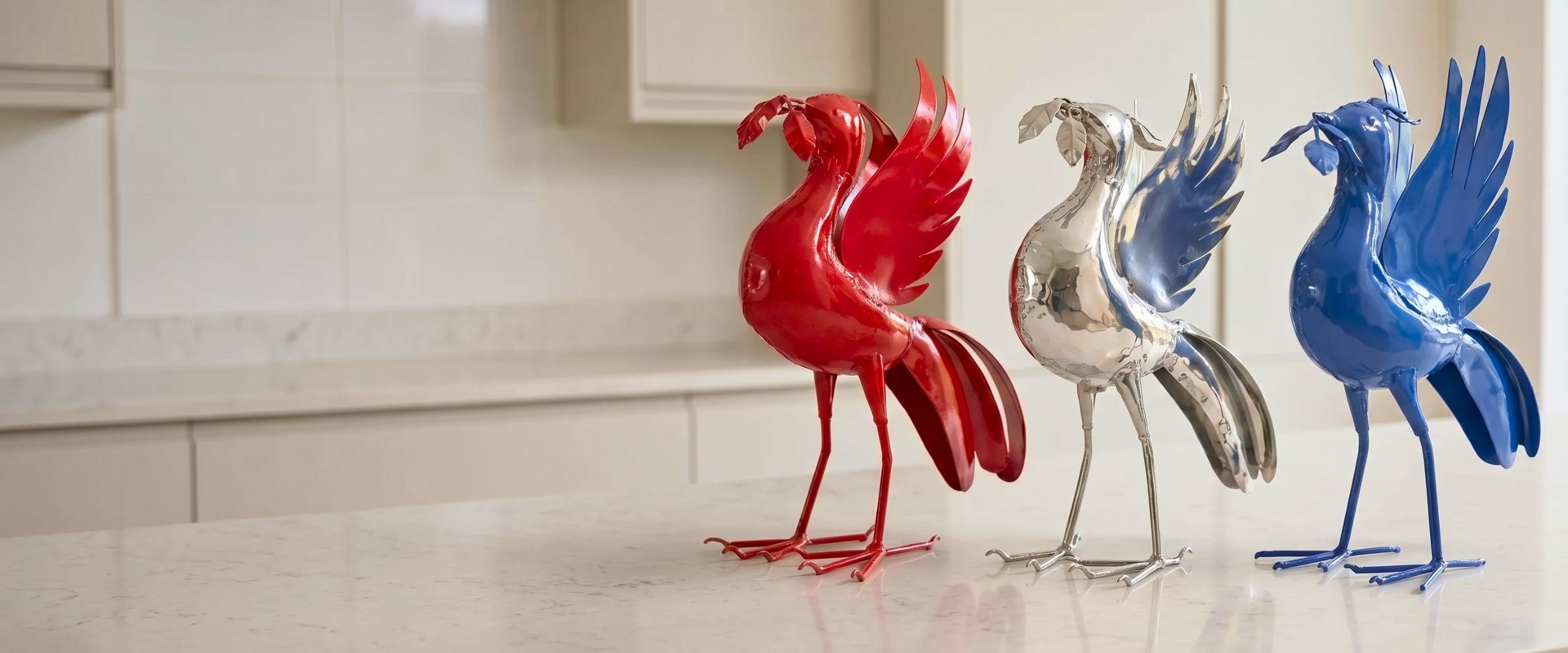 Pangea chrome Liver Bird sculpture