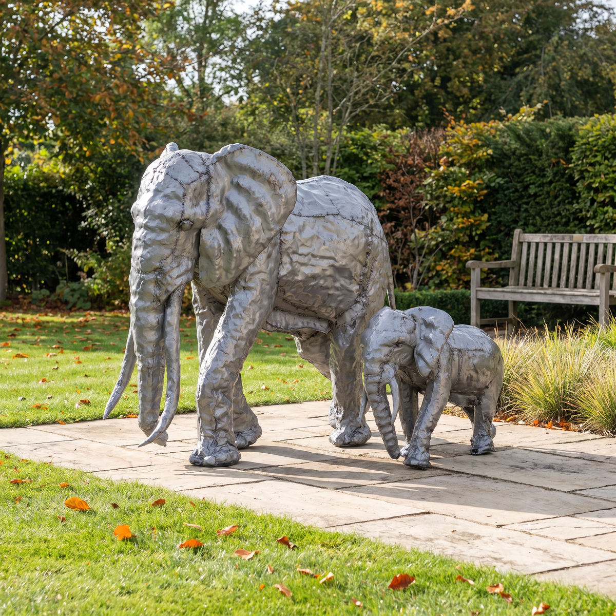 Silver-grey 4ft and 2ft elephant sculpture bundle, autumn garden